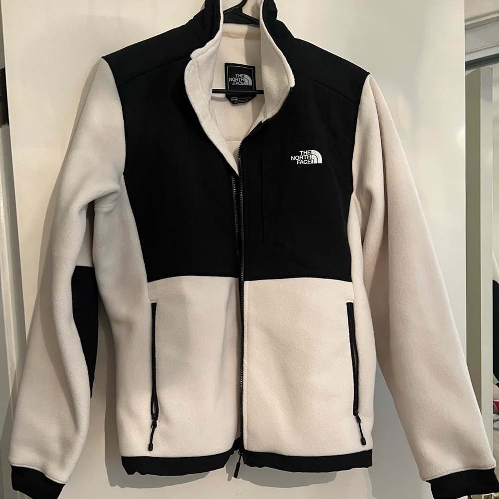 The North Face women’s cream and black jacket. Size Medium